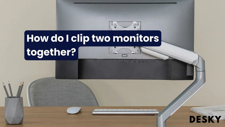How do I clip two monitors together?