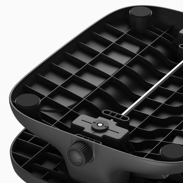 reinforced steel base of height adjustable cushioned foot rest