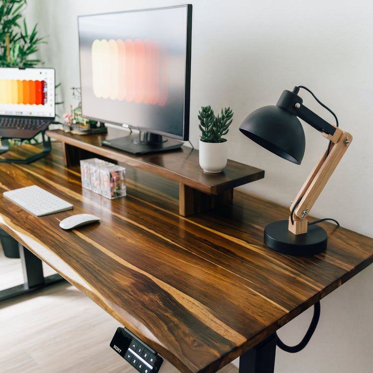 Black Desky Wooden Axis lamp on top of desk