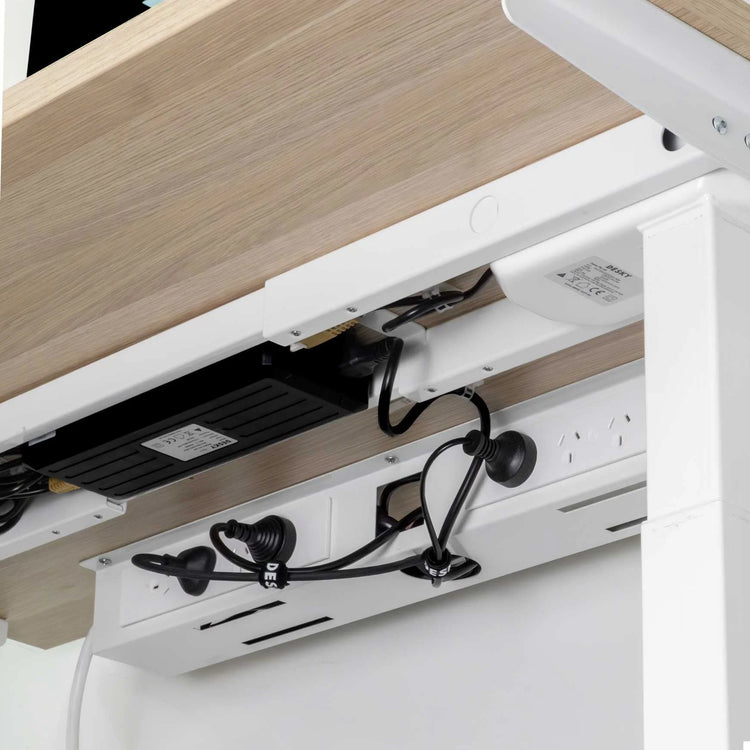 Desky mini cable management tray in white under desk