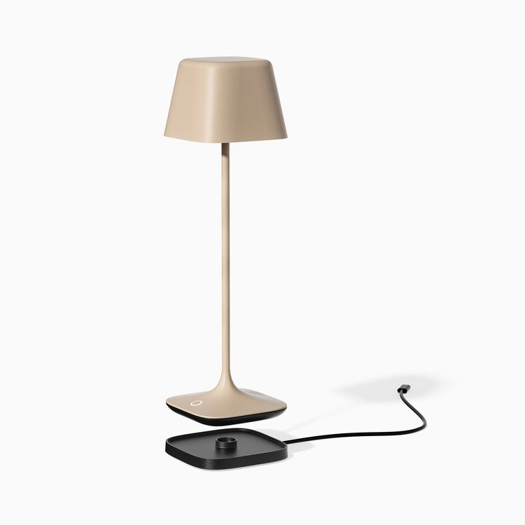 Desky Cube Cordless Desk Lamp in sand with rechargeable dock