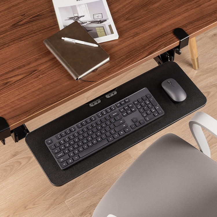 work ergonomically with a keyboard tray