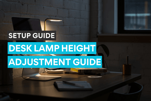 A work from home ofiice desk with a desk lamp in use