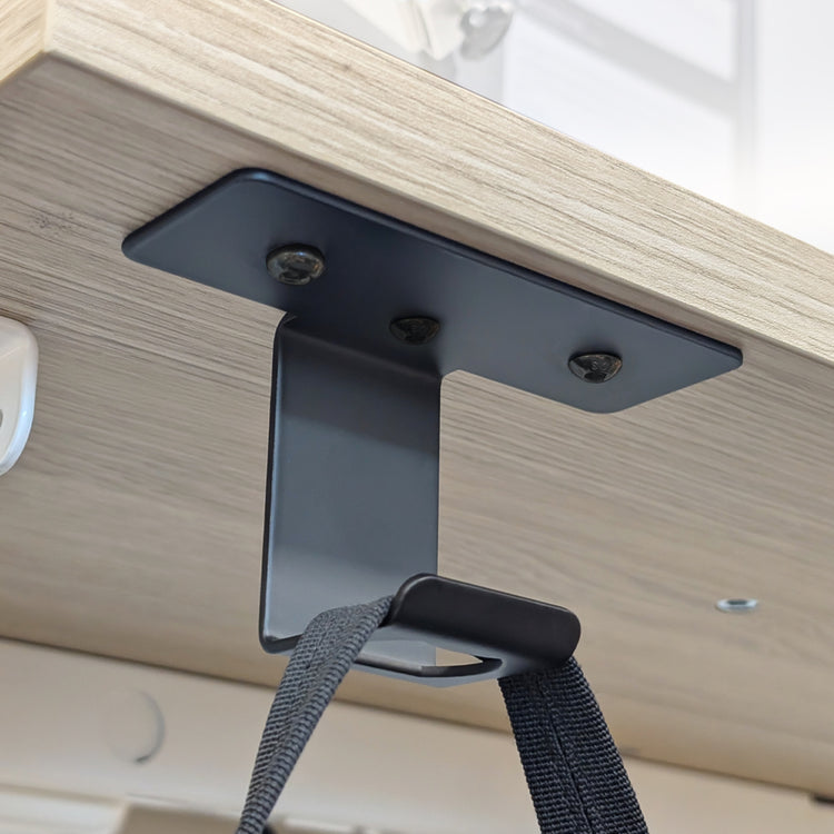 desky bottle opener and bag hook attached on desk