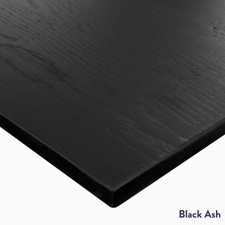 Black ash hardwood corner desktop finish