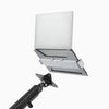 Desky expandable laptop mount attached to arm in white