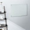 Desky glass whiteboard on office wall