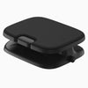 A black ergonomic footrest with a textured top surface and a contoured base, shown on a plain white background.