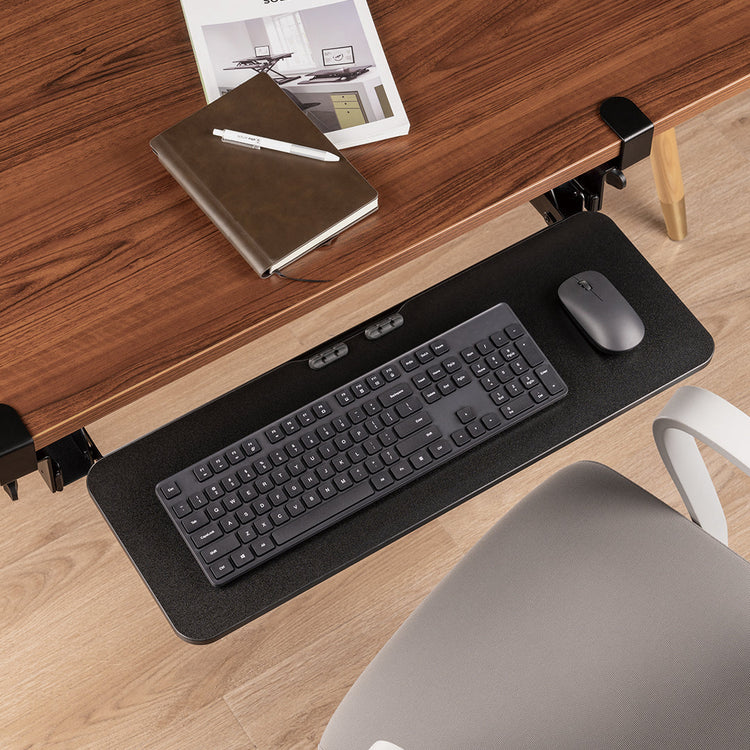 work ergonomically with a keyboard tray