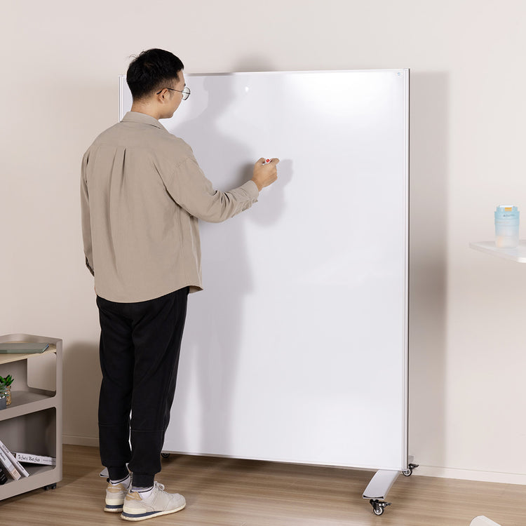 Man writing on Desky mobile whiteboard