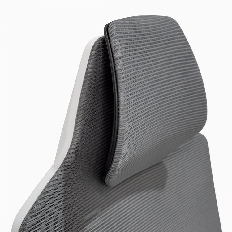 Adjustable headrest height gaming chair in white