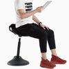 Desky Sit Stand Pro Active Stool used by man