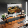 Desky monitor stand setup on desk in walnut hardwood 